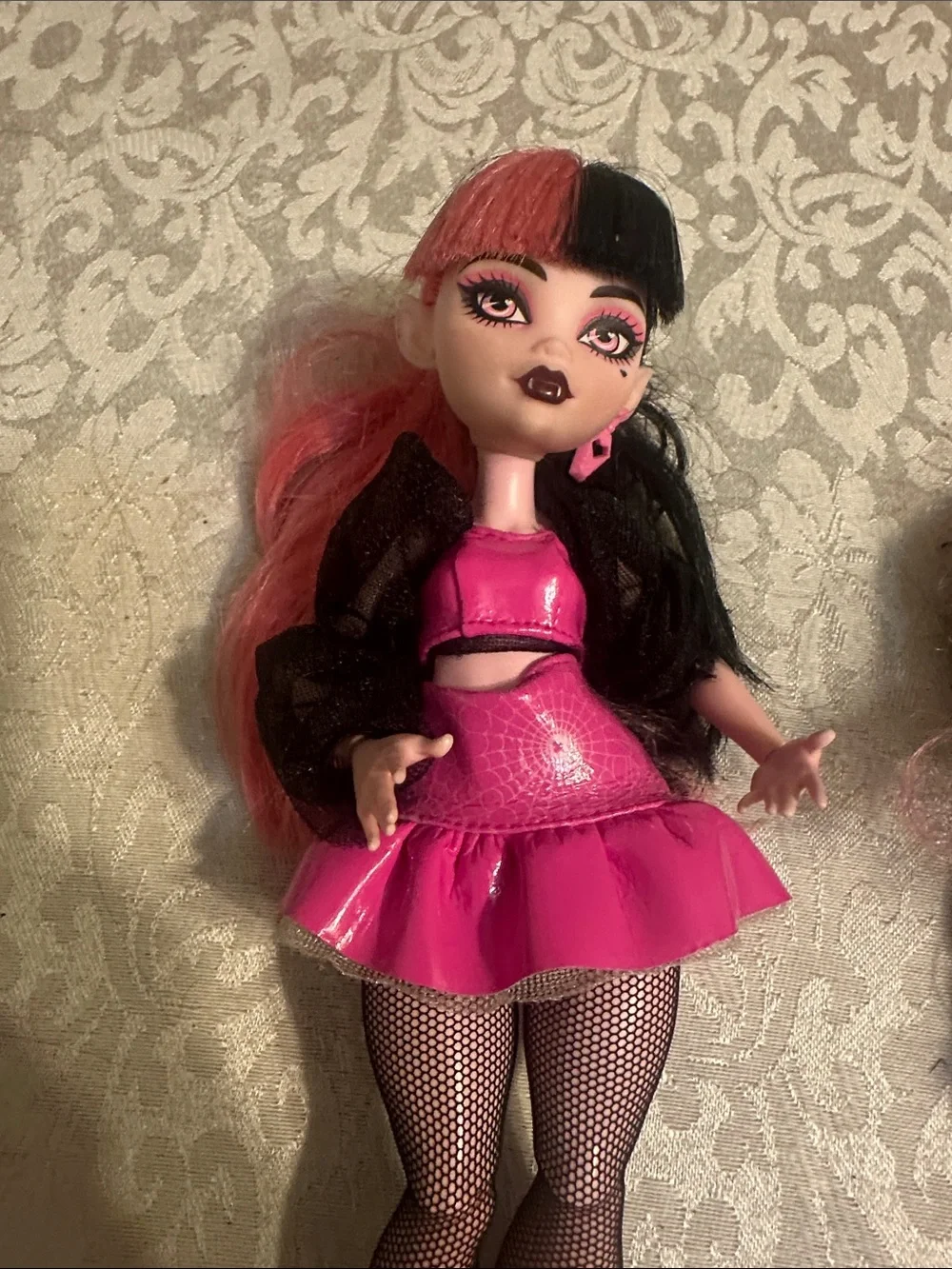 Pair of Monster High Dolls with Pink & Purple Outfits